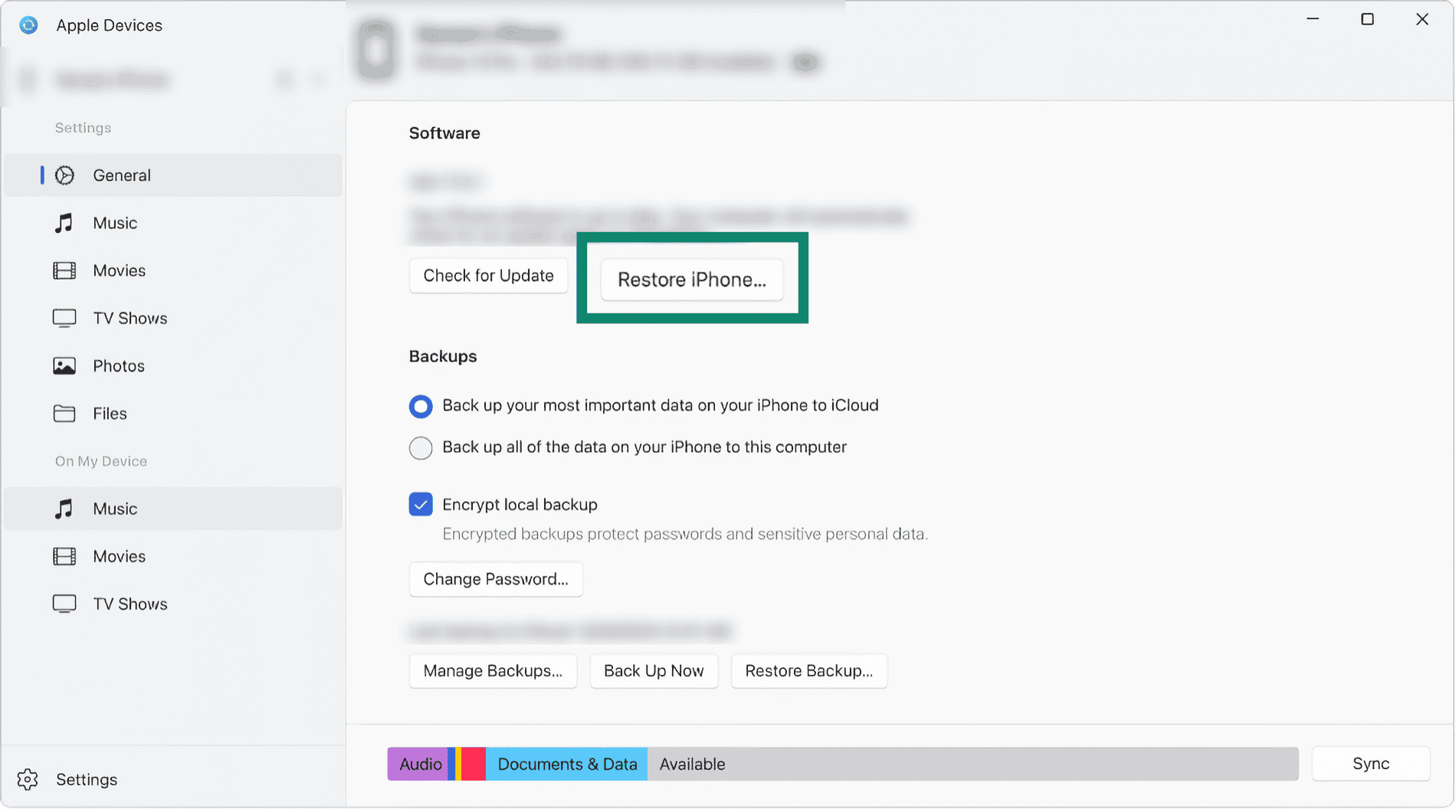macOS Finder's iPhone screen with the Restore iPhone button in focus.